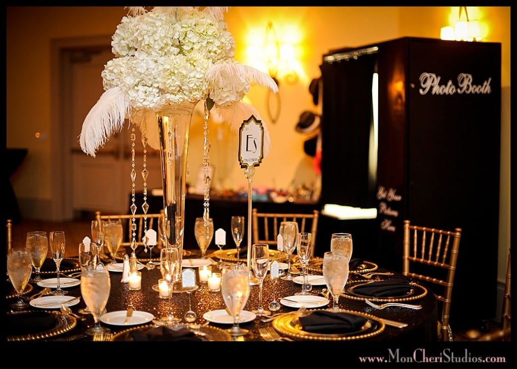 black classic photo booth in background of reception table