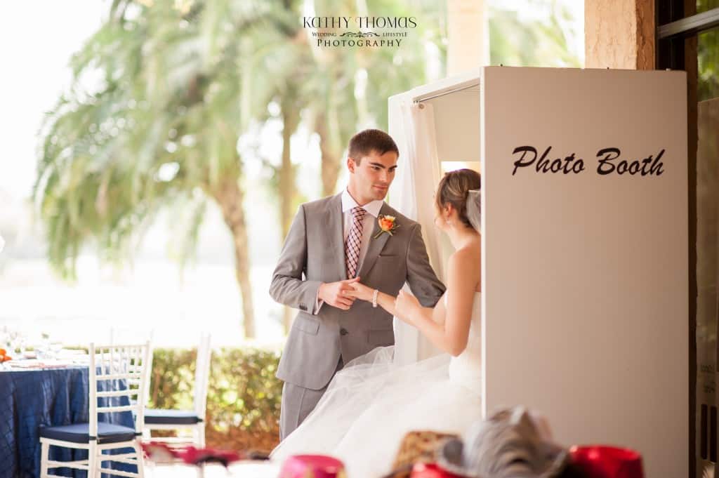 bride and groom inside photo booth