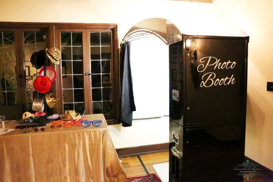 black printz booth style photo booth at casa feliz wedding with props