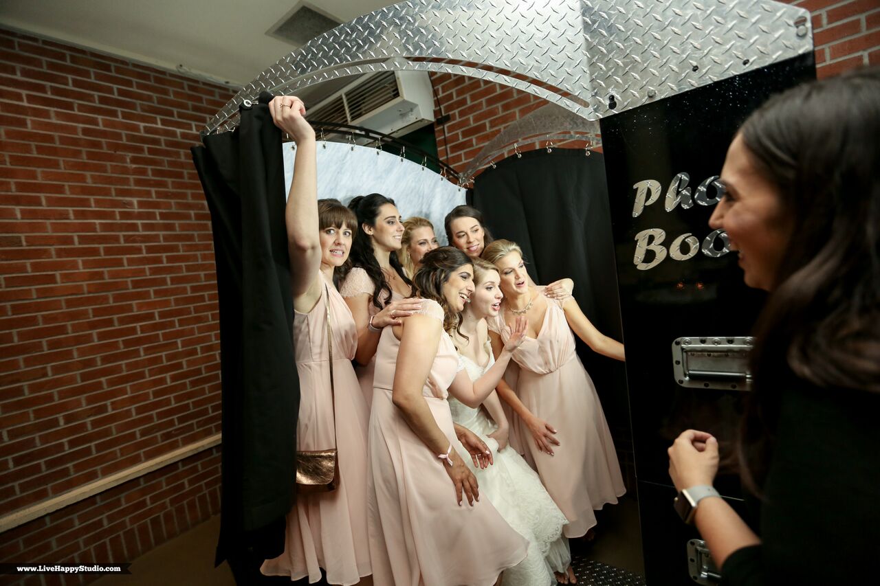 black printz booth at scottish inspired wedding at The Golden Bear Club bridesmaids posing in booth