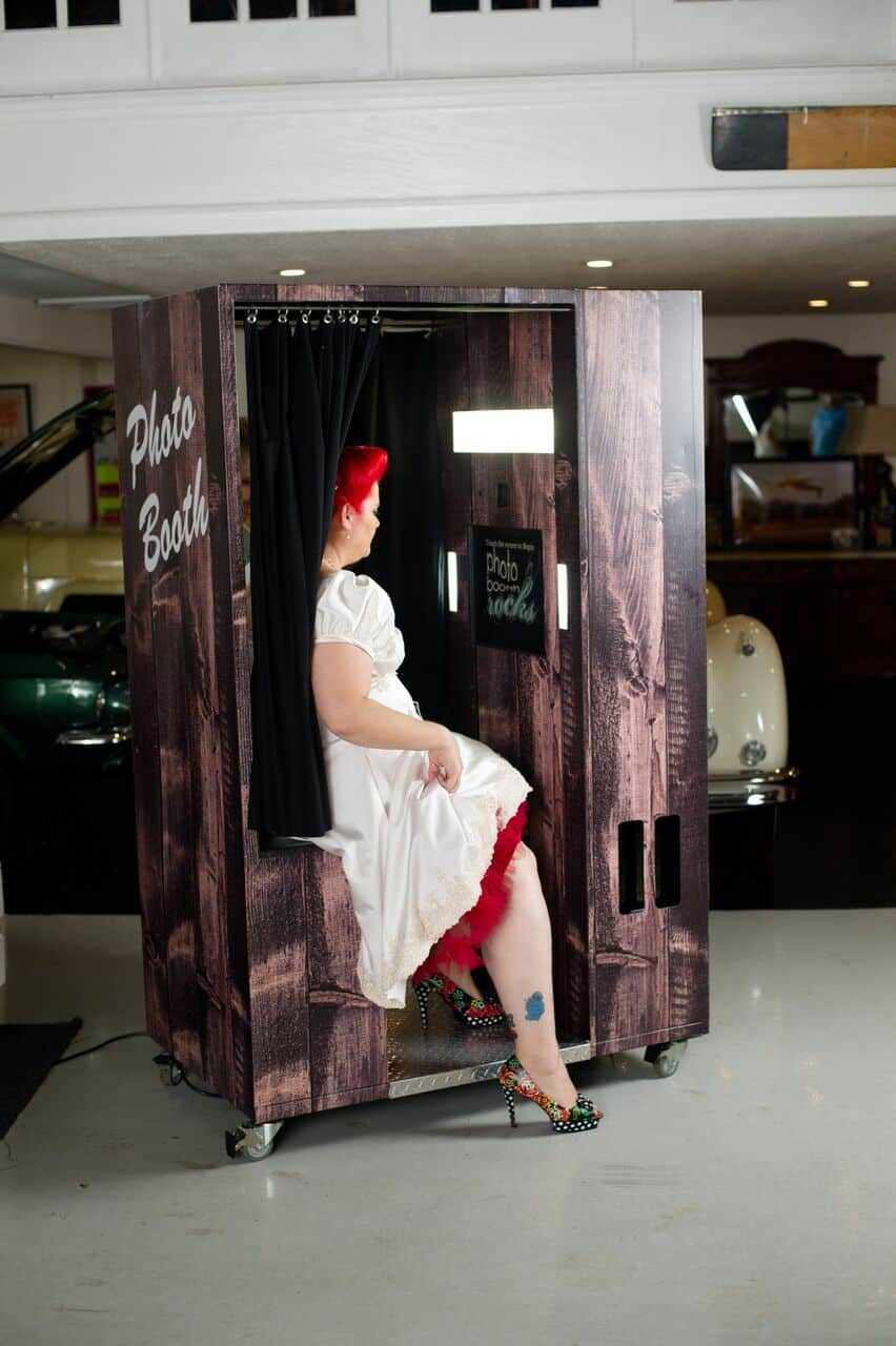 new classic wooden photo booth with bride posing from Photo Booth Rocks at wedding 