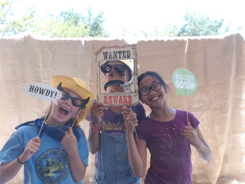 kids with wanted poster photo booth prop