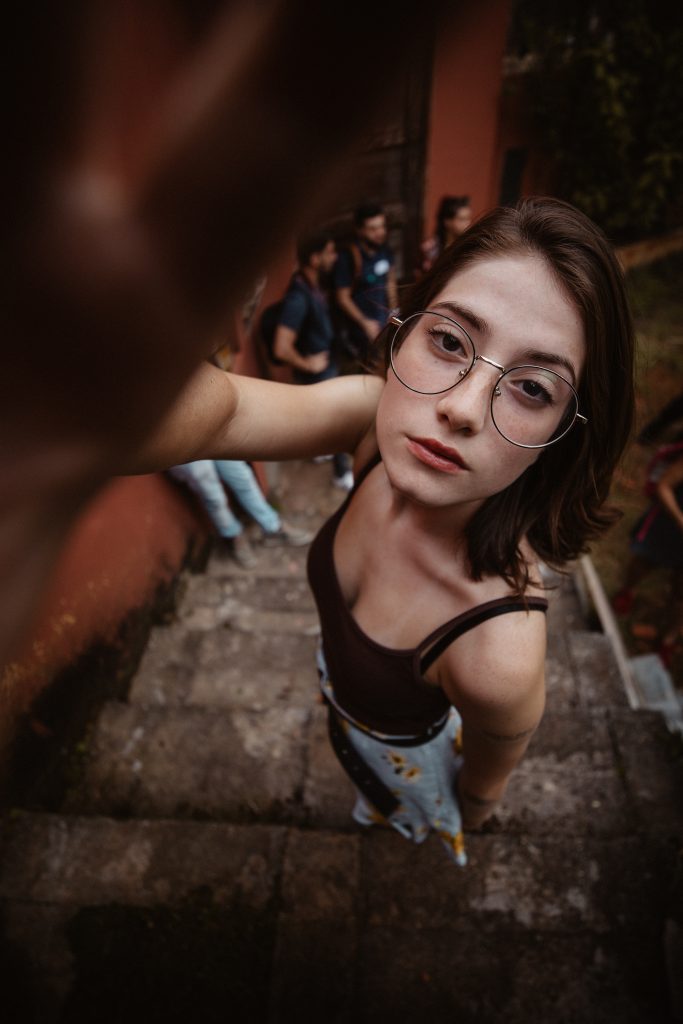 woman taking selfie at a tilted angle