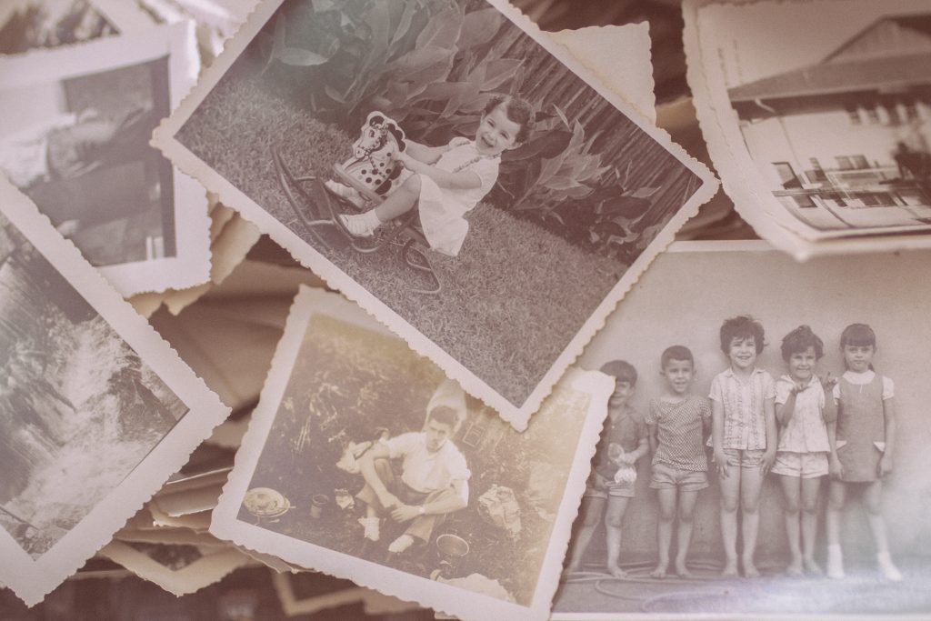 scattered collection of old family photos