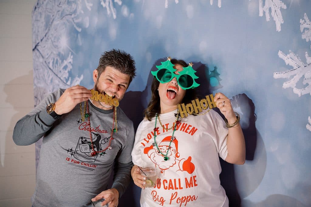 holiday party photo booth fun in the winter wonderland backdrop