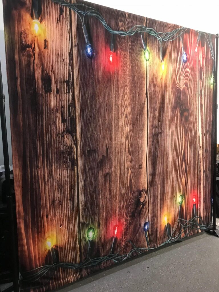 wood backdrop with christmas lights