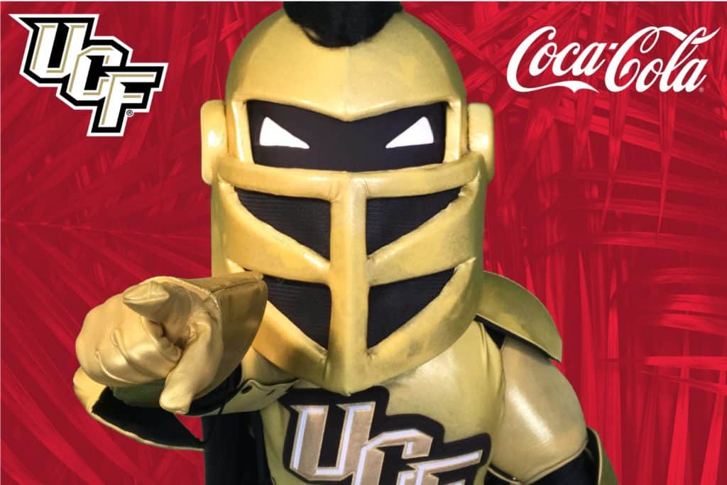 UCF Knight mascot in front of green screen backdrop