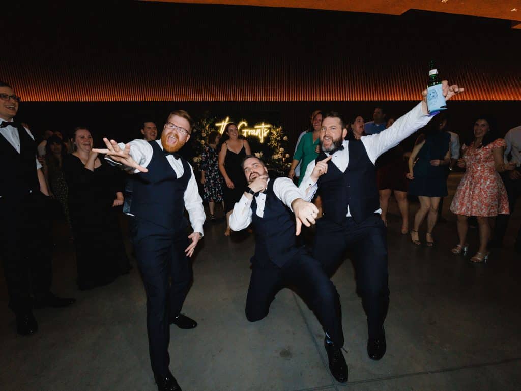 Bobby and groomsmen partying at his wedding