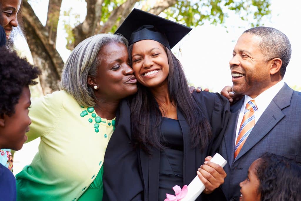 A student and her family at her graduation party.