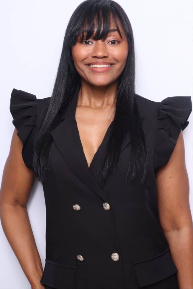 Professional headshot booth for corporate events, smiling woman in a black blazer top